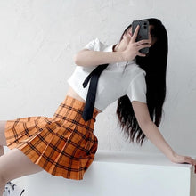 "NARA" PLEATED SKIRT